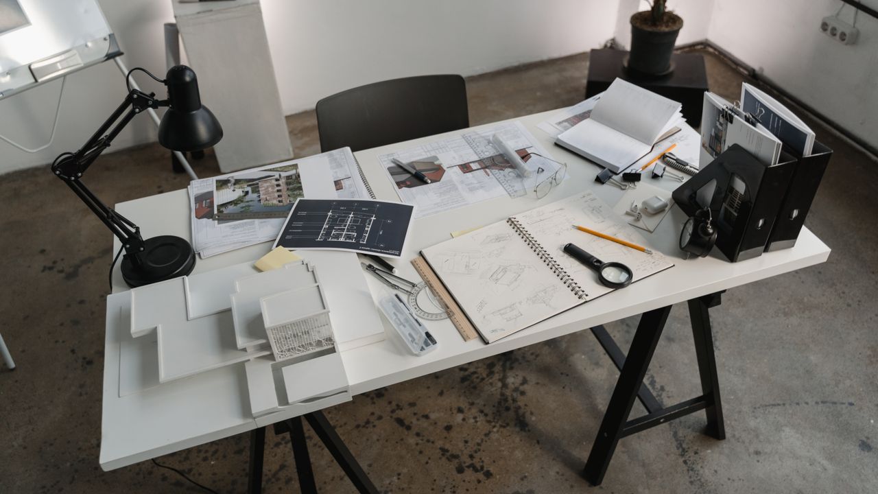 Maqueta arquitetónica e plantas de um projeto de reabilitação em Lisboa